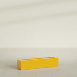 Salon Box Planter in Gloss Saffron, 36" Long, shown empty