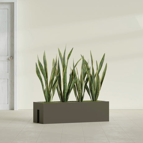 Tiergarden Railing fiberglass planter in Matte Bronze, shown planted, in a sunlit interior