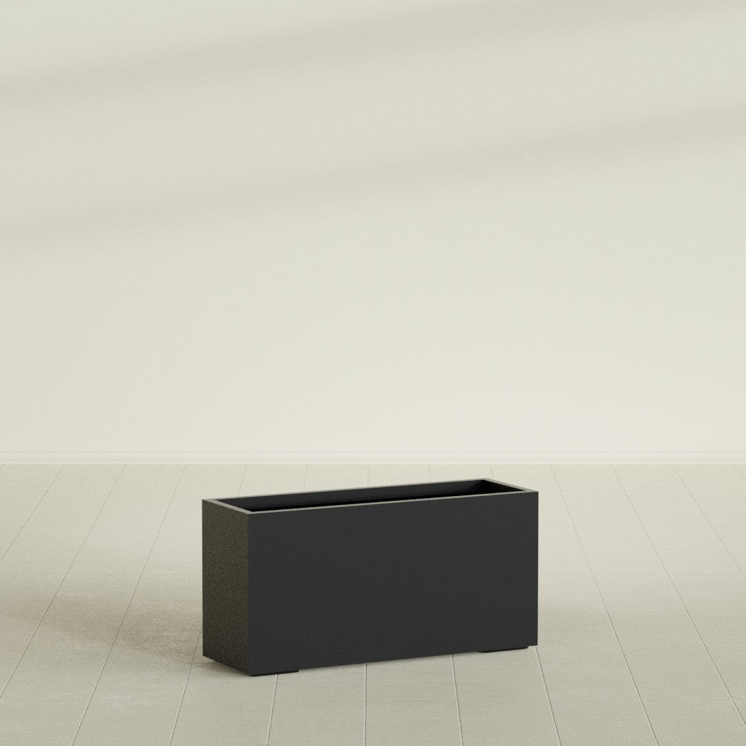 Tolga Rectangular Planter in Matte Black, 48"L × 16"D × 24"H, shown empty