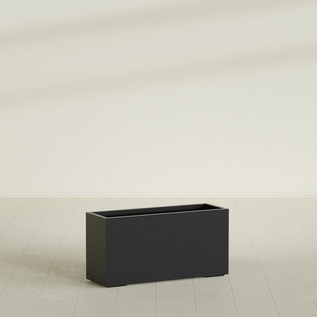 Tolga Rectangular Planter in Matte Black, 48"L × 16"D × 24"H, shown empty