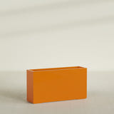 Potsdam Rectangular Planter in Gloss Tangerine, 60"L × 16"D × 32"H, shown empty