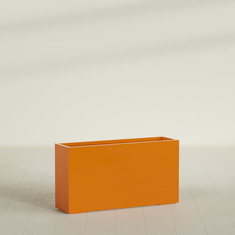 Potsdam Rectangular Planter in Gloss Tangerine, 60"L × 16"D × 32"H, shown empty