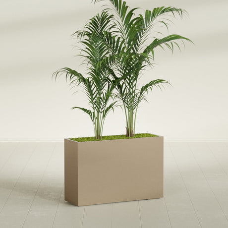 Potsdam Corner fiberglass planter in Gloss Metallic Gold, shown planted, in a sunlit interior