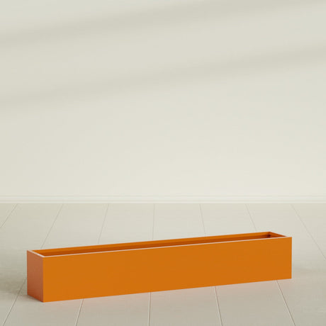 Monaco Rectangle Planter in Gloss Tangerine, 44"L, shown empty