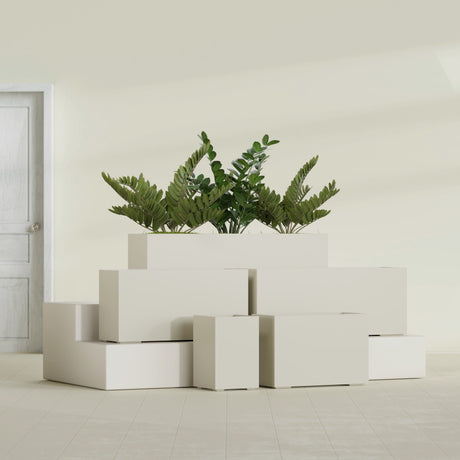 Tolga Rectangular fiberglass planter in Satin Beige, size range, in a sunlit interior