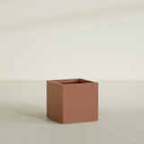 Montroy Cube Planter in Matte Terra Cotta, 28", shown empty