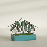 Antwerp Rectangular fiberglass planter in Satin Seafoam Green, shown planted, in a sunlit interior