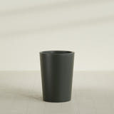 Tegel Round Tapered Planter in Matte Charcoal, 22"D × 30"H, shown empty