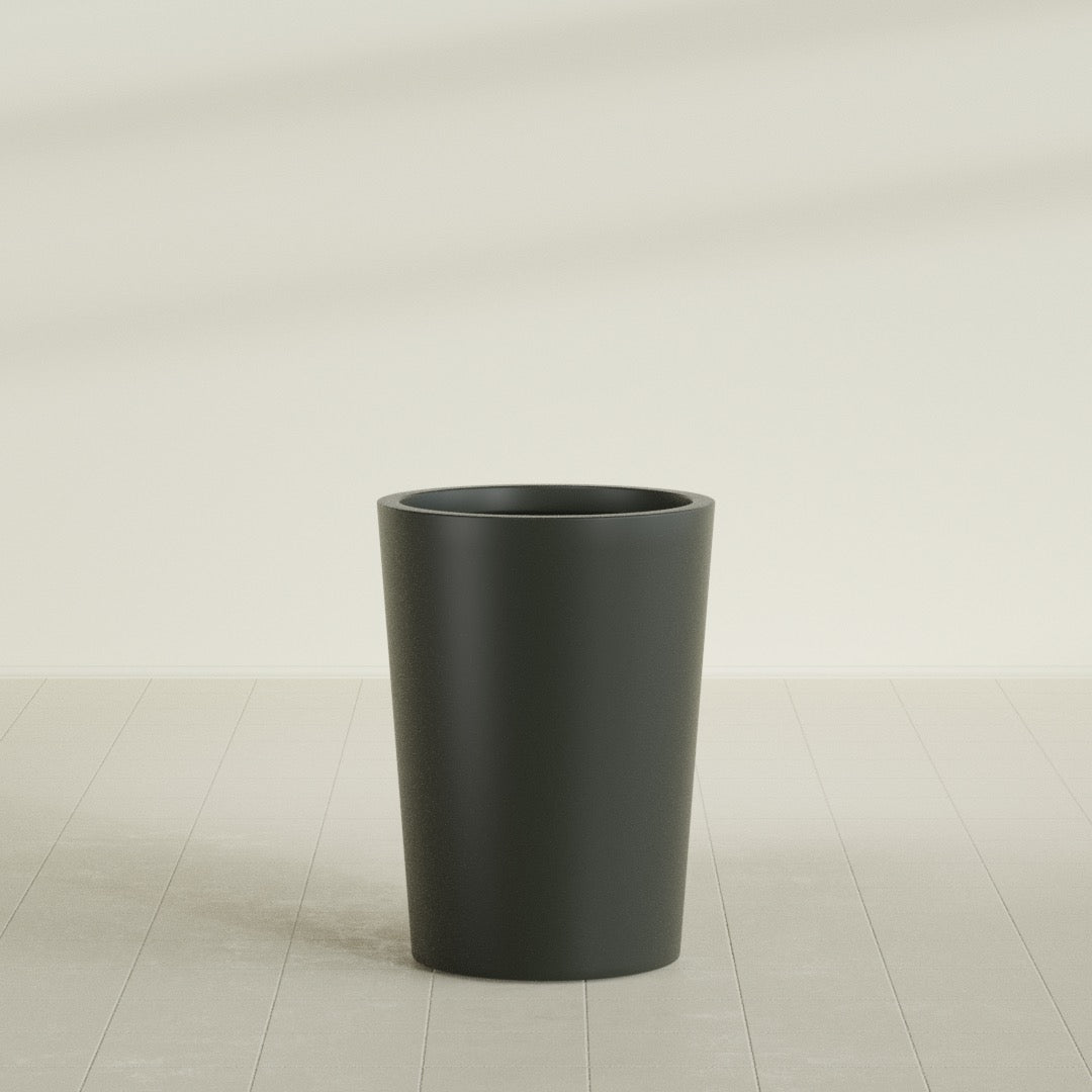 Tegel Round Tapered Planter in Matte Charcoal, 22"D × 30"H, shown empty
