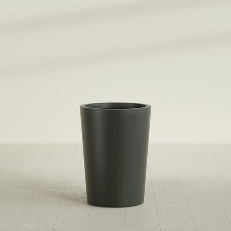 Tegel Round Tapered Planter in Matte Charcoal, 22"D × 30"H, shown empty