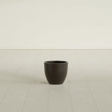 Wannsee Round Planter in Matte Dark Brown, 15"D × 13"H, shown empty