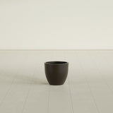 Wannsee Round Planter in Matte Dark Brown, 15"D × 13"H, shown empty