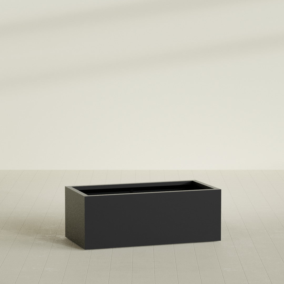 Torino Wide Rectangular Planter in Matte Black, 48"L × 24"D × 18"H, shown empty