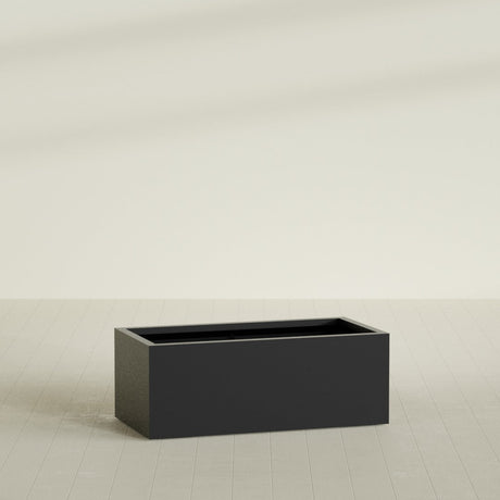 Torino Wide Rectangular Planter in Matte Black, 48"L × 24"D × 18"H, shown empty