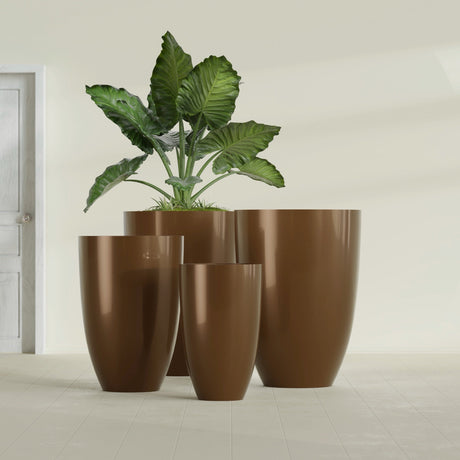 Brannan Tapered Round fiberglass planter in Metallic Bronze, size range, in a sunlit interior