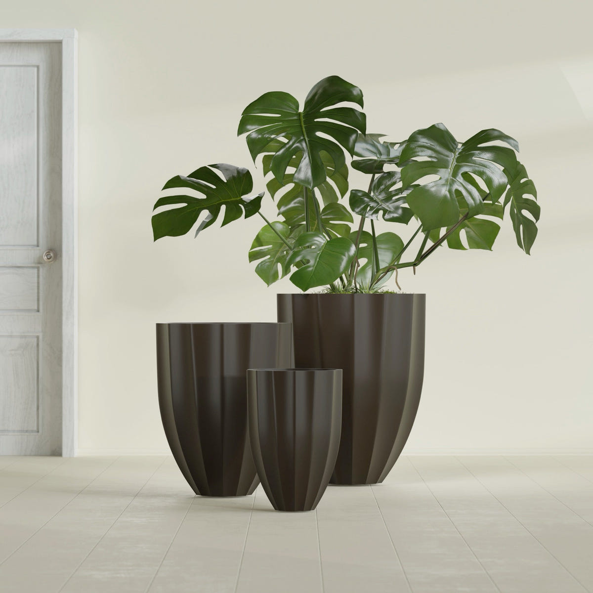 Alicante Fluted fiberglass planter in Matte Dark Brown, size range, in a sunlit interior