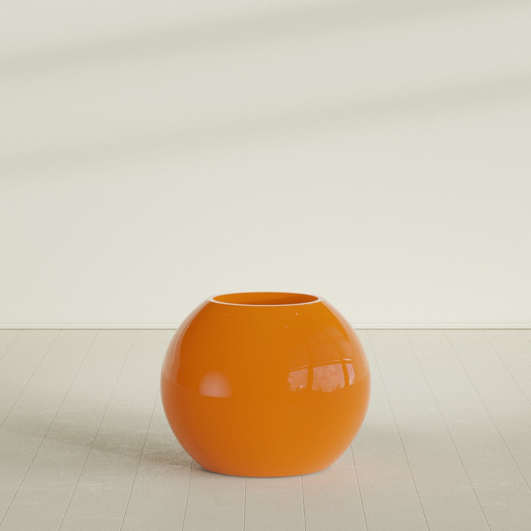 Globe Planter in Gloss Tangerine, 30"D × 24"H, shown empty