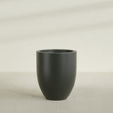 Valencia Tapered Round Planter in Matte Charcoal, 27"D × 31"H, shown empty