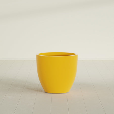 Wannsee Round Planter in Gloss Saffron, 33"D × 29"H, shown empty