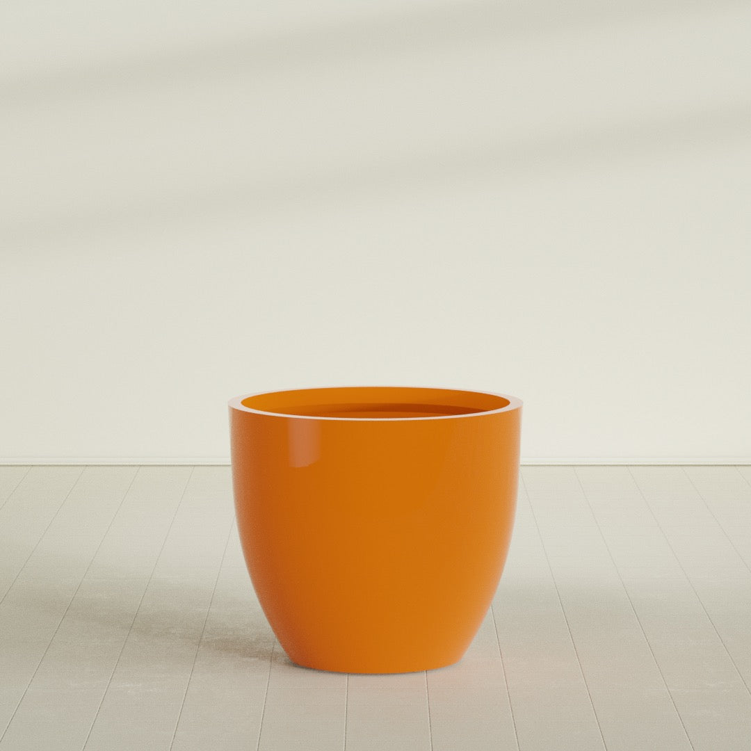 Wannsee Round Planter in Gloss Tangerine, 44"D × 39"H, shown empty