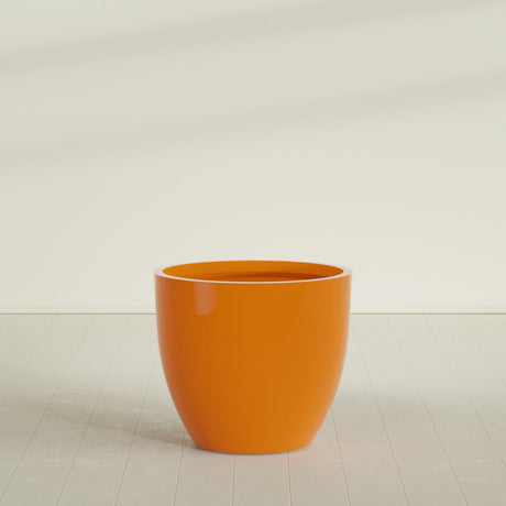 Wannsee Round Planter in Gloss Tangerine, 44"D × 39"H, shown empty