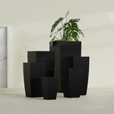 Toulan Tapered Square fiberglass planter in Matte Black, size range, in a sunlit interior