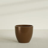 Wannsee Round Planter in Metallic Bronze, 44"D × 39"H, shown empty