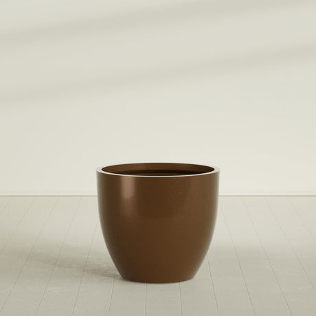 Wannsee Round Planter in Metallic Bronze, 44"D × 39"H, shown empty