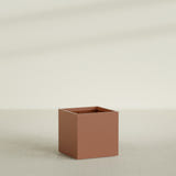 Montroy Cube Planter in Matte Terra Cotta, 32", shown empty