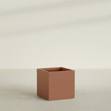 Montroy Cube Planter in Matte Terra Cotta, 32", shown empty