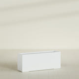 Tolga Rectangular Planter in Matte Bright White, 60"L × 16"D × 24"H, shown empty