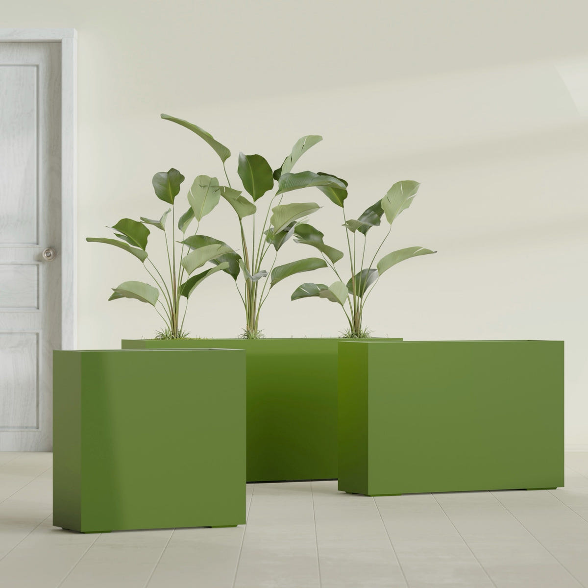 Milano Narrow Rectangular fiberglass planter in Satin Green, shown planted, in a sunlit interior