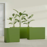 Milano Narrow Rectangular fiberglass planter in Satin Green, shown planted, in a sunlit interior
