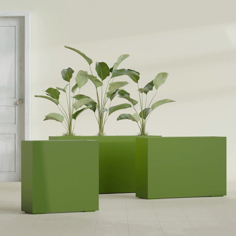 Milano Narrow Rectangular fiberglass planter in Satin Green, shown planted, in a sunlit interior