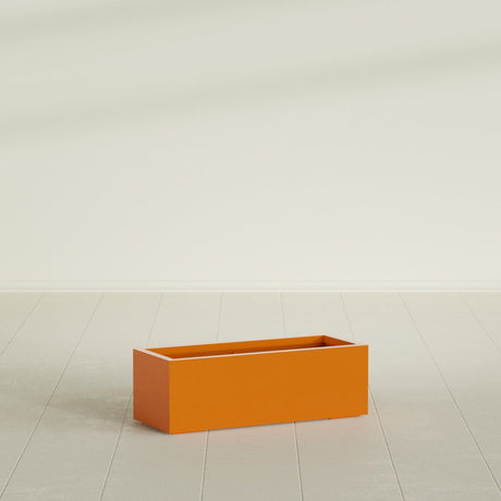 Cuba Low Rectangular Planter in Gloss Tangerine, 36"L × 14"D × 12"H, shown empty