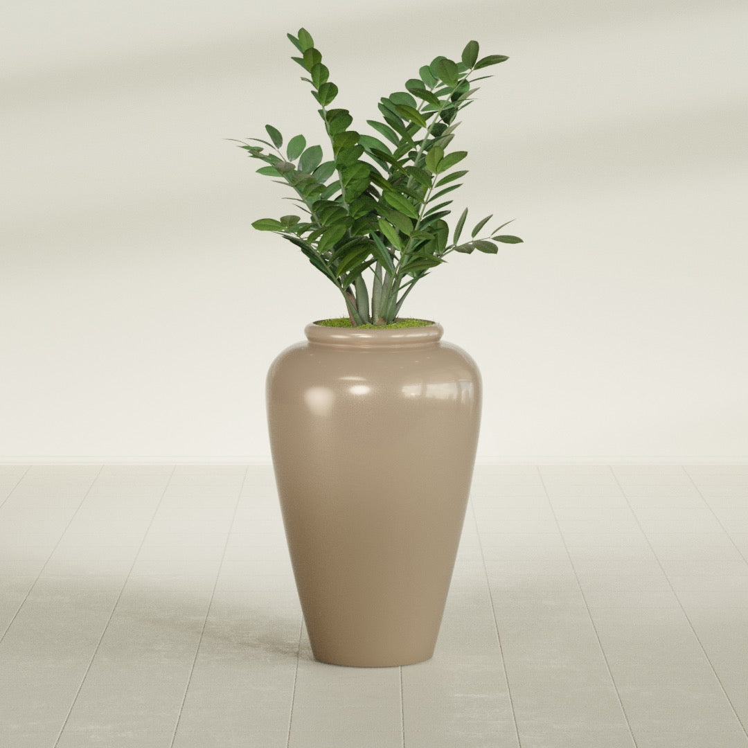Barà Jar fiberglass planter in Gloss Metallic Gold, shown planted, in a sunlit interior