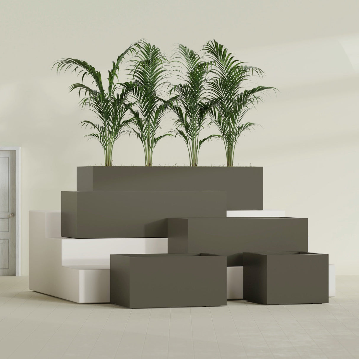 Torino Wide Rectangular fiberglass planter in Matte Bronze, size range, in a sunlit interior