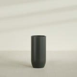 Saint Tropez Bullet Round Planter in Matte Charcoal, 24"D × 50"H, shown empty