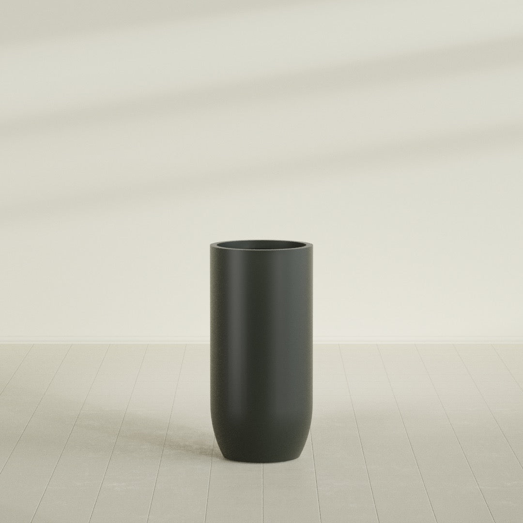 Saint Tropez Bullet Round Planter in Matte Charcoal, 24"D × 50"H, shown empty