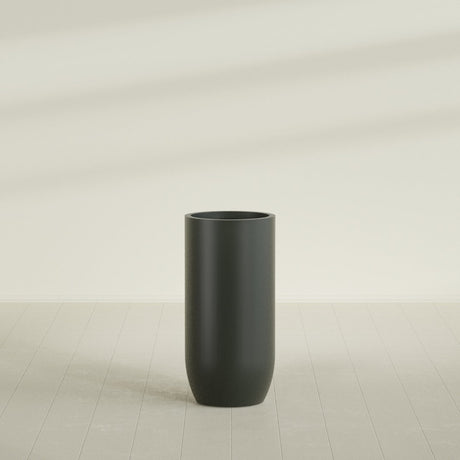 Saint Tropez Bullet Round Planter in Matte Charcoal, 24"D × 50"H, shown empty
