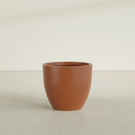 Wannsee Round Planter in Matte Terra Cotta, 33"D × 29"H, shown empty