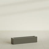 Salon Box Planter in Matte Bronze, 36" Long, shown empty