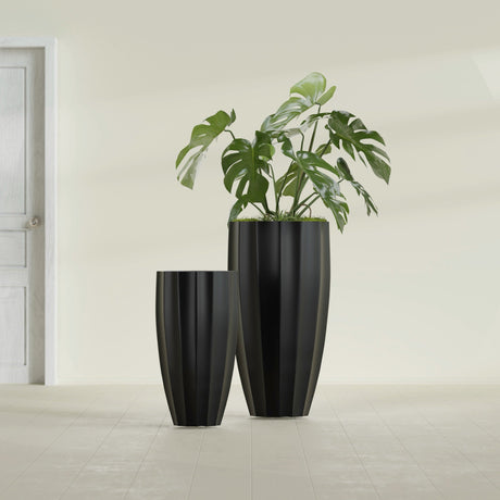 San Jose Tall Fluted fiberglass planter in Matte Black, size range, in a sunlit interior