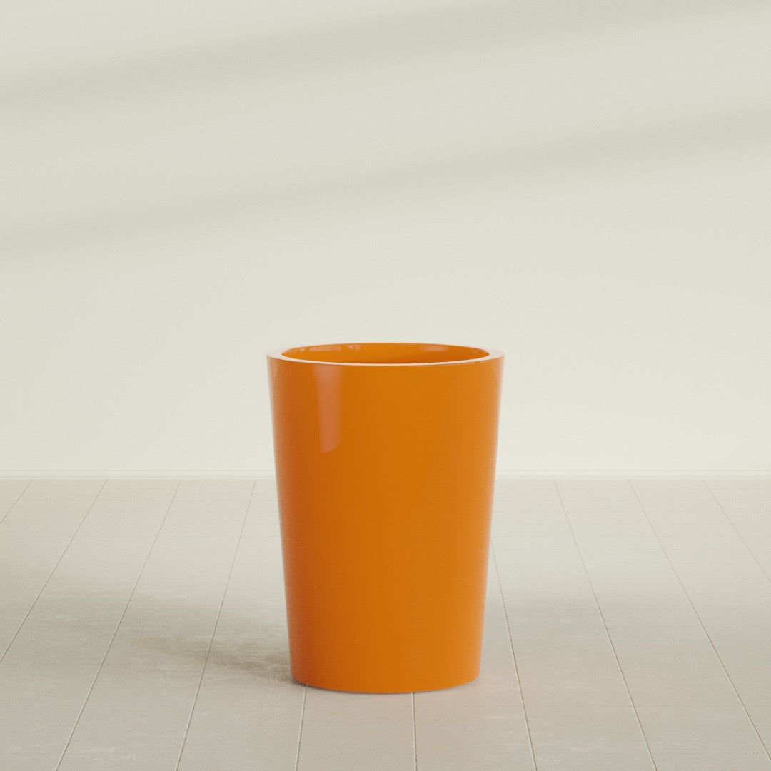 Tegel Round Tapered Planter in Gloss Tangerine, 22"D × 30"H, shown empty