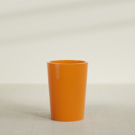 Tegel Round Tapered Planter in Gloss Tangerine, 22"D × 30"H, shown empty