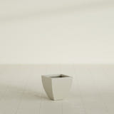 Lima Tapered Square Planter in Satin Beige, 12", shown empty
