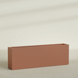 Hollywood Narrow Rectangular Planter in Matte Terra Cotta, 72"L × 12"D × 24"H, shown empty