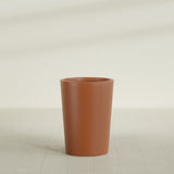 Tegel Round Tapered Planter in Matte Terra Cotta, 22"D × 30"H, shown empty