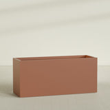Brisbane Rectangular Planter in Matte Terra Cotta, 72"L × 24"D × 32"H, shown empty