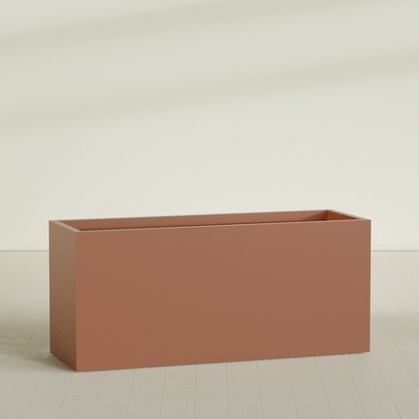 Brisbane Rectangular Planter in Matte Terra Cotta, 72"L × 24"D × 32"H, shown empty